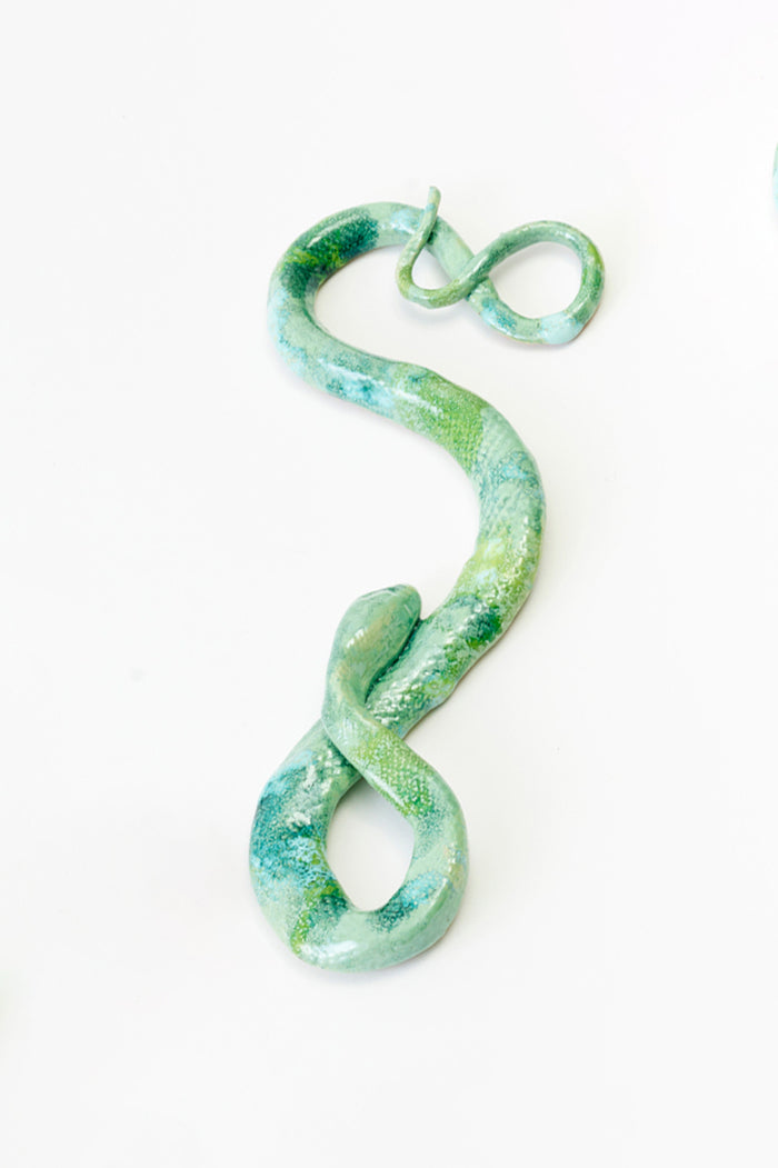 CERAMIC SNAKES.