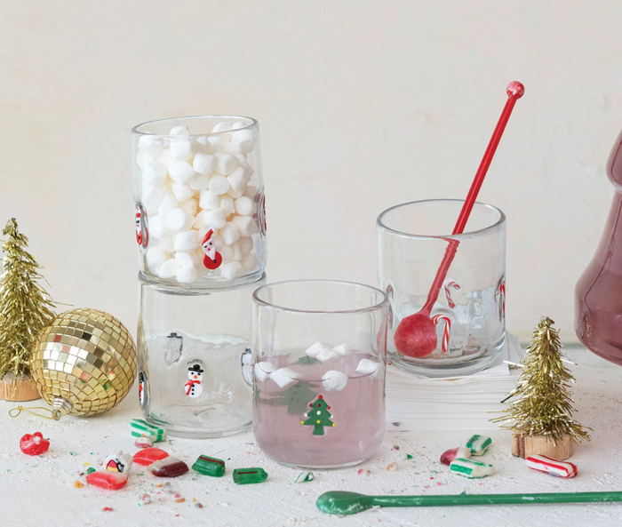 DRINKING GLASS WITH EMBEDDED HOLIDAY ICON PATTERN
