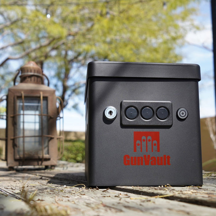 GunVault GVRV100BK22 Range Vault Handgun Safe On Deck next to lantern